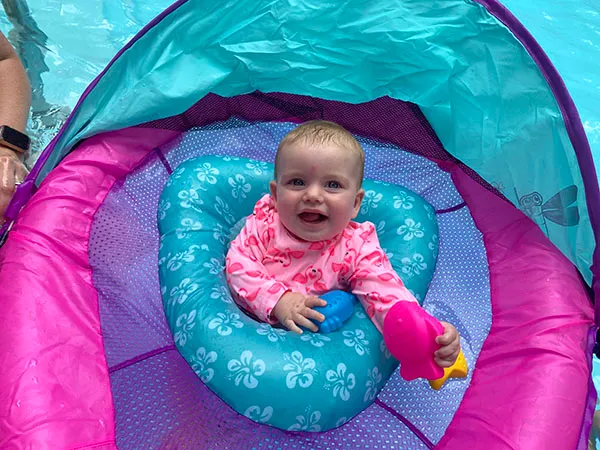 A baby in a pool float